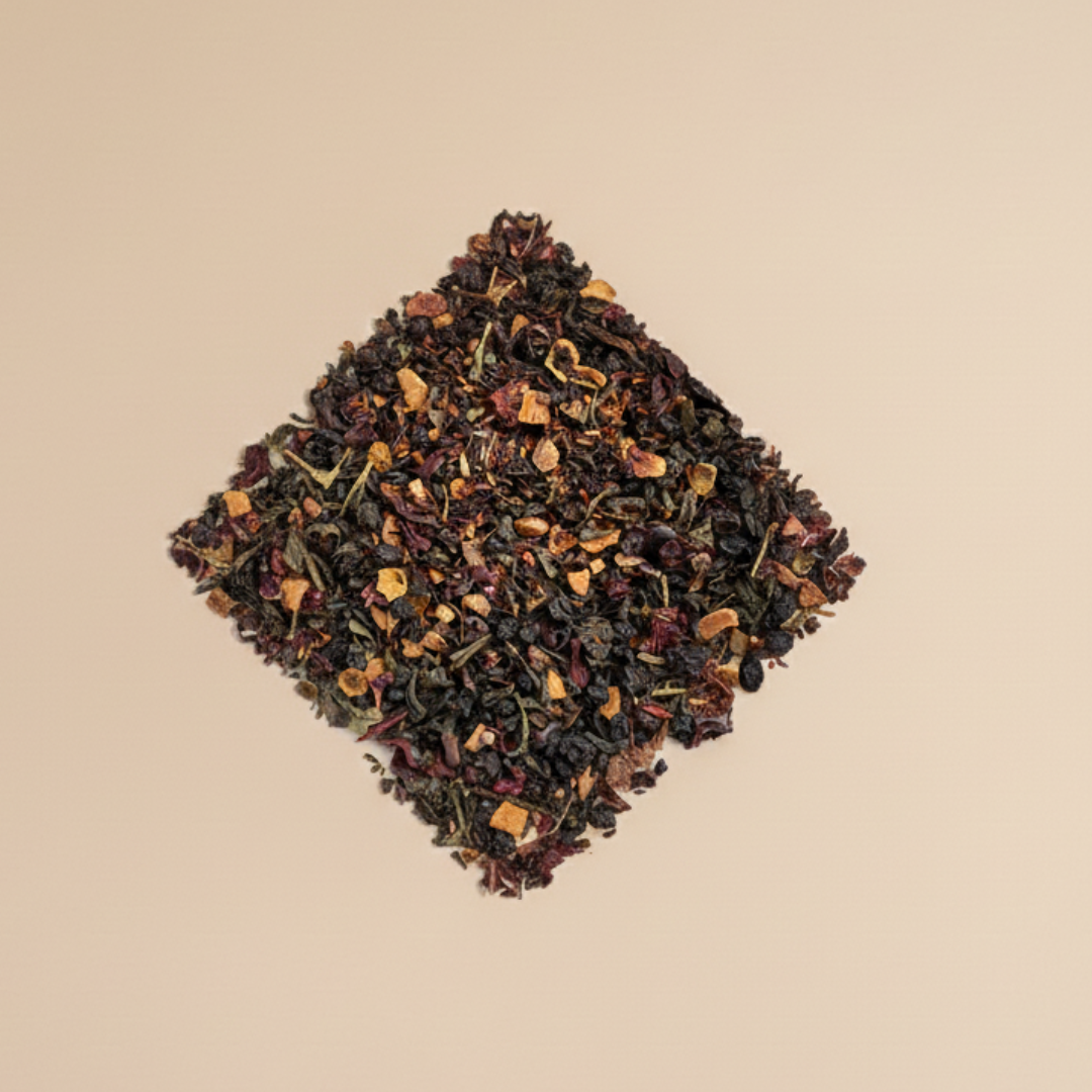 Tea leaves arranged in a diamond shape on a beige background