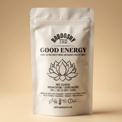 Tea package with 'Babooshy Tea Good Energy' on a beige background